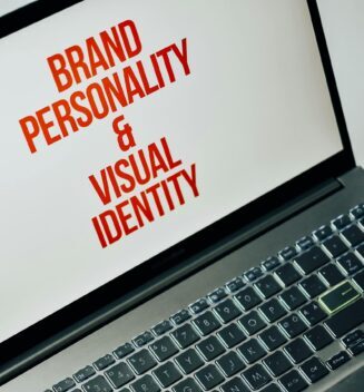 Laptop screen showing text on brand personality and visual identity for marketing strategy.